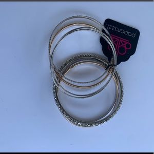 Silver and gold bangles